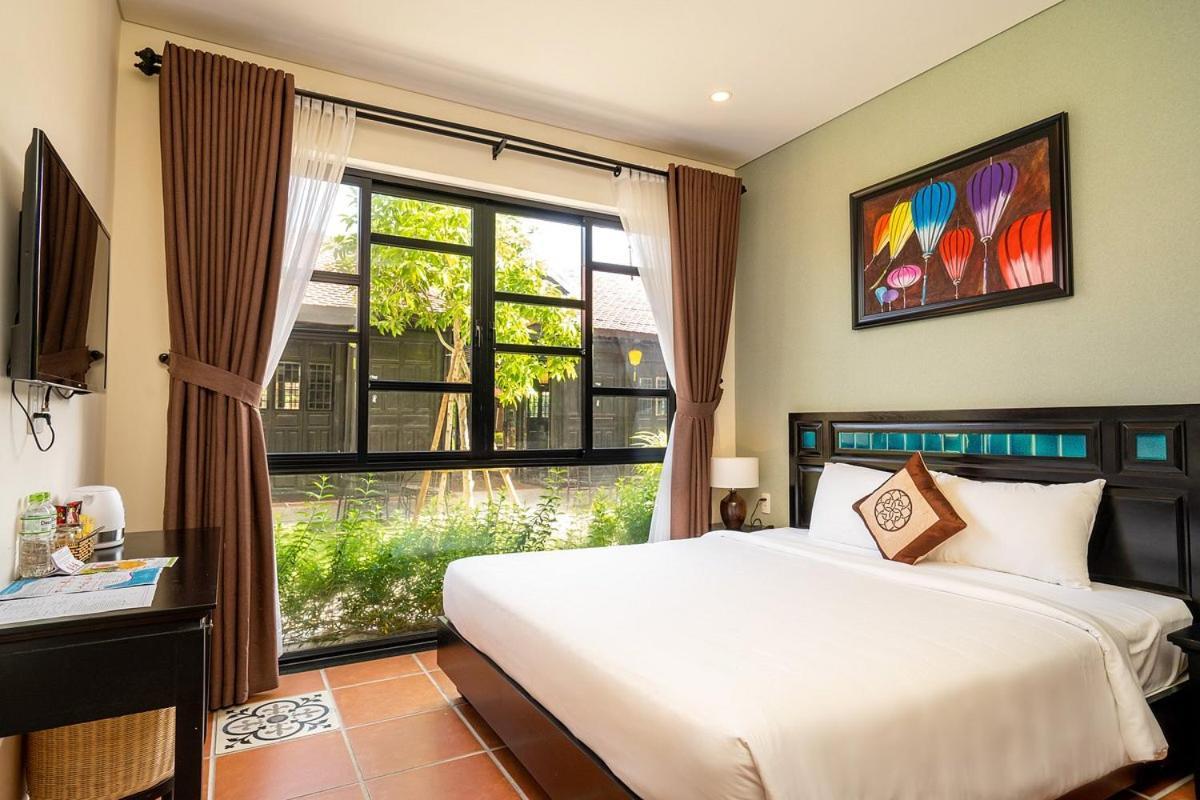 Hoi An Hometown And Resort An Bàn Extérieur photo